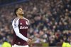 Aston Villa's Marcus Rashford reacts after missing a chance to score during the English Premier League soccer match between Aston Villa and Liverpool at Villa Park in Birmingham, England, Wednesday, Feb. 19, 2025. (AP Photo/Darren Staples)