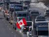 Frank Gunn / Canadian Press files
                                In this 2022 photo, a convoy of truckers protesting measures taken to curb the spread of COVID-19 drive to Parliament Hill in Ottawa.
