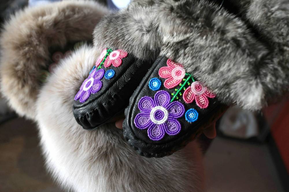 RUTH BONNEVILLE / FREE PRESS
Beaded moccasins by Rosa Scribe, one of many works of Indigenous artists for sale at Manitobah.