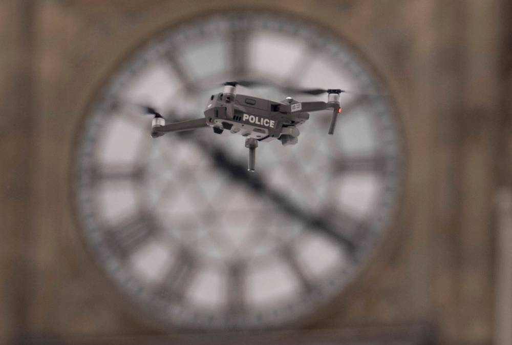 The Canadian Press
Drones, like this police drone flying near the Peace Tower on Parliament Hill in Ottawa, are an example of a technology with new uses — and new dangers.