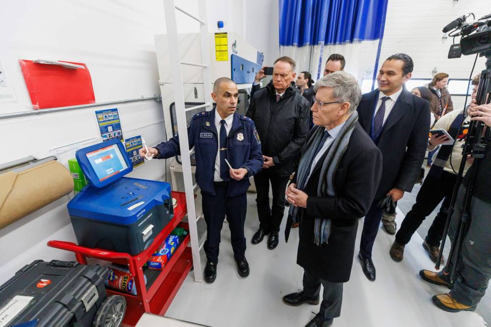 MIKE DEAL / FREE PRESS
                                CBSA chief of operations Steven Wolski (left) demonstrates the use of a fentanyl detection device during a tour of the border security service in Emerson.