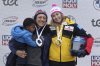 FILE - From left, third placed Elana Meyers Taylor of USA and Laura Nolte of Germany celebrate on the podium during the award ceremony of the Women's Monobob World Cup race in Sigulda, Latvia, Saturday, Feb. 3, 2024. (AP Photo/Oksana Dzadan)