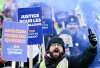 People take part in a protest in Montreal, Saturday, Feb. 15, 2025, against Amazon's decision to shutter its seven warehouses in Quebec, including what was Canada's only unionized Amazon facility. THE CANADIAN PRESS/Graham Hughes
