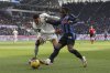 Atalanta's Ademola Lookman, right, and Venezia's Joel Schingtienne vie for the ball during the Serie A soccer match between Atalanta and Venezia at the Gewiss Stadium in Bergamo, Italy, Saturday, March 1, 2025. (Stefano Nicoli/LaPresse via AP)