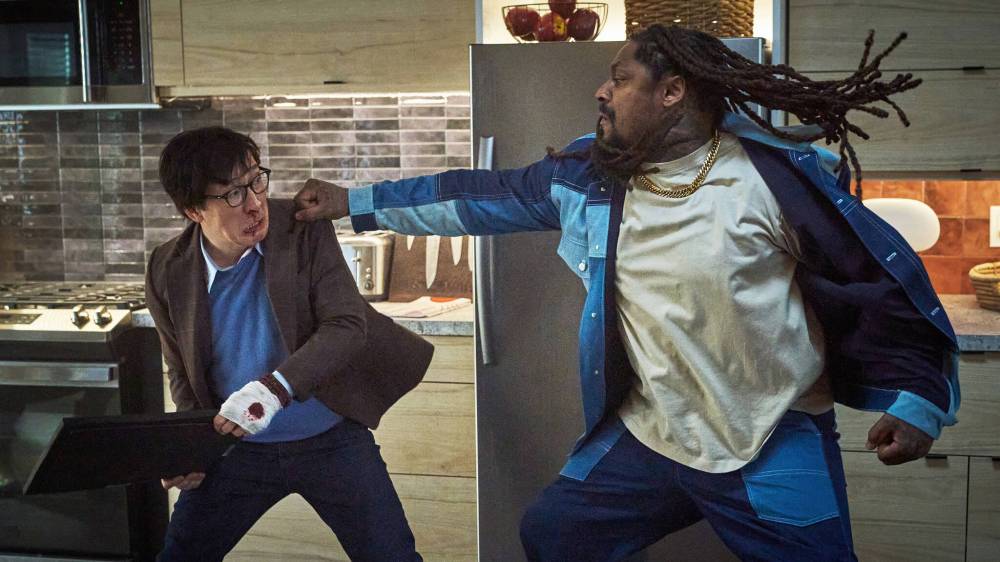 ALLEN FRASER / UNIVERSAL PICTURES
Ke Huy Quan (left) and Marshawn Lynch