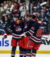 John Woods / THE CANADIAN PRESS
                                Winnipeg Jets’ Gabriel Vilardi, Mark Scheifele and Kyle Connor celebrate Vilardi’s goal against the New York Islanders during the second period of the Jets 4-3 win Friday in Winnipeg.