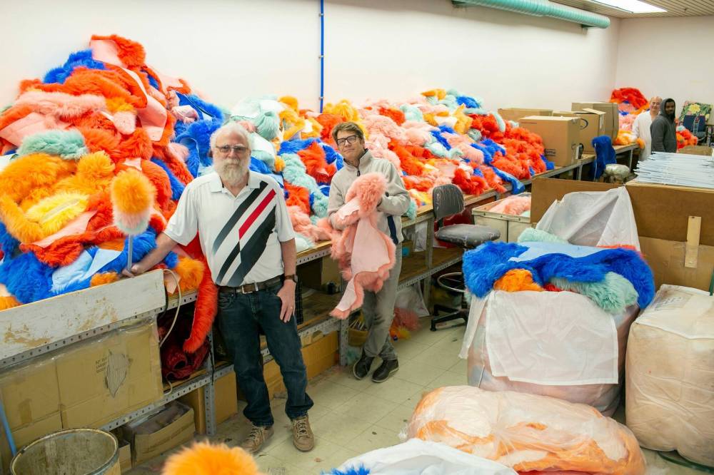 BROOK JONES/FREE PRESS
Wonderful World of Sheepskin co-owners Myron Schultz, 63, (right) and Melvyn Pollins, 75, pictured next to pile of sheepskins that will be turned into lambswool dusters.