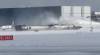 Pearson International Airport firefighters work on an upside down Delta Airlines plane, which was heading from Minneapolis to Toronto when it crashed on the runway Monday afternoon. This still image is taken from handout video footage published to social media. (The Canadian Press/Handout- 1 Minute Morning)