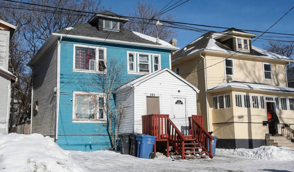 JOHN WOODS / FREE PRESS
                                Neighbours reported suspicious activity around the Alfred Avenue house at the centre of a double homicide.