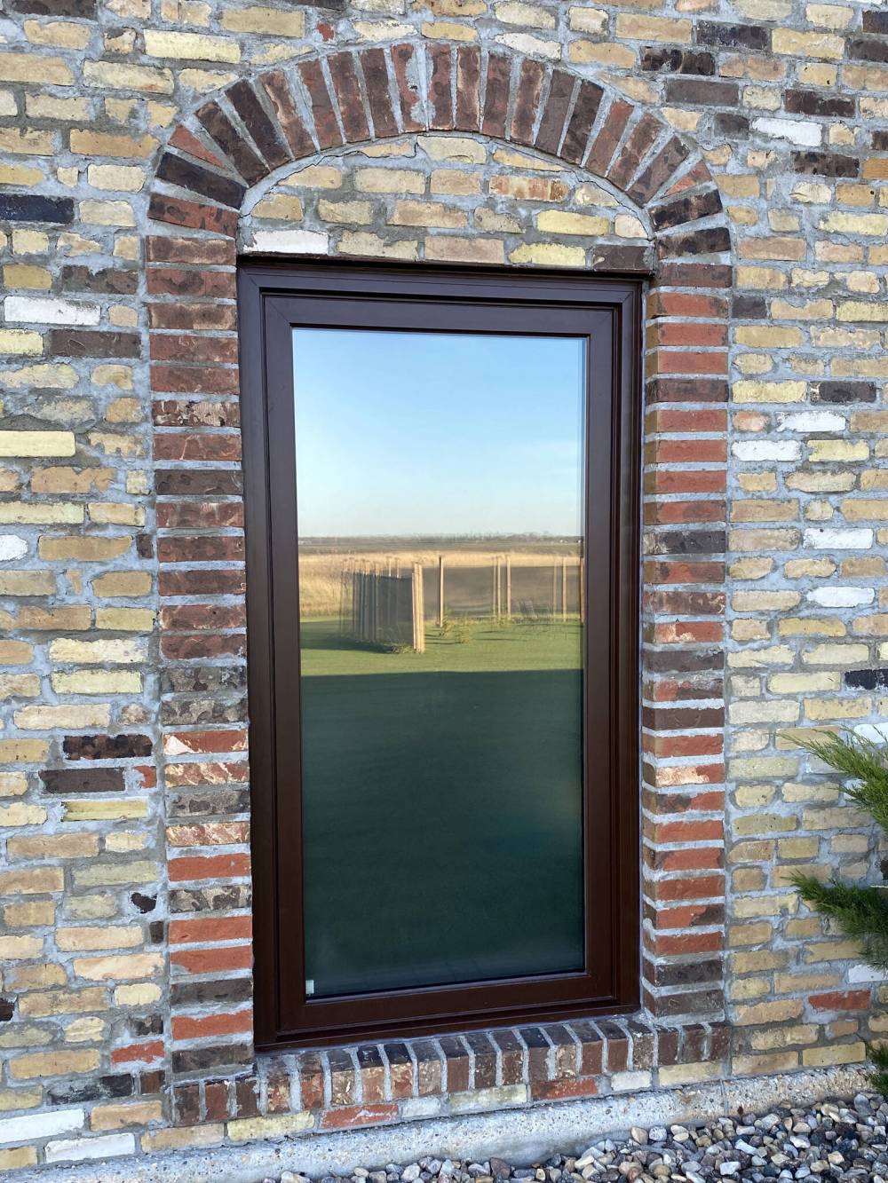 MARC LABOSSIERE / FREE PRESS
The semi-transparent vinyl film applied to the interior of the window glass adds privacy without changing the look.