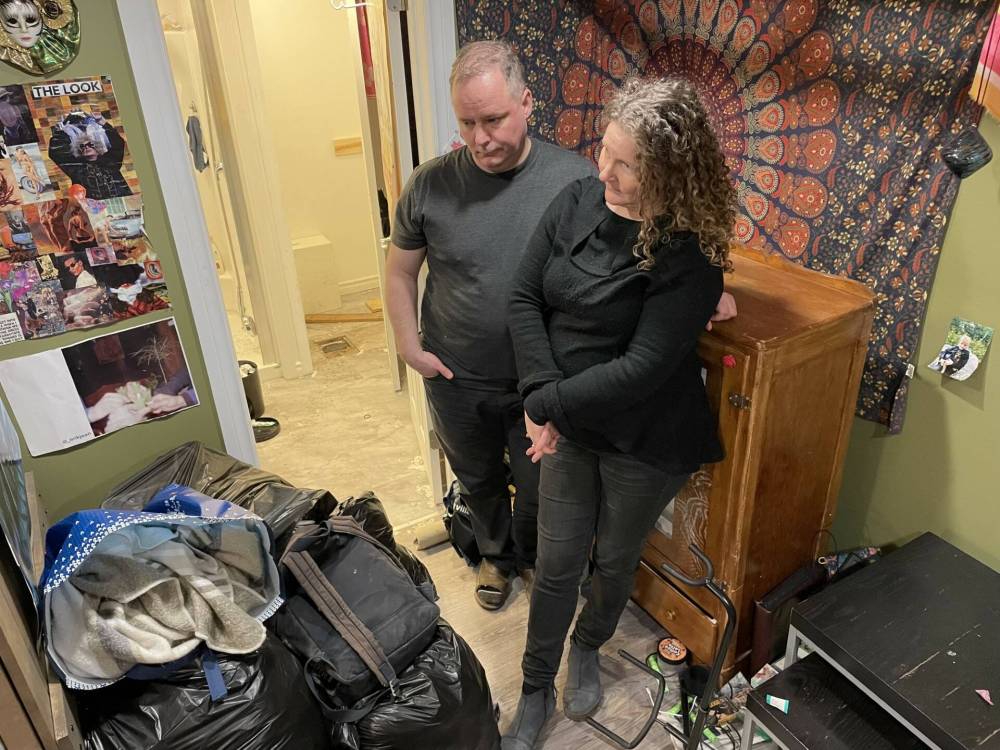 Sherburn Street residents Melanie Reimer and Kenton Friesen incurred thousands of dollars in costs and hotel stays after a broken pipe leaked sewage into their home. (Ruth Bonneville / Free Press)