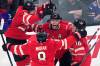 Charles Krupa / The Associated Press
                                Connor McDavid (centre) celebrates Thursday after scoring the title-winning goal against the United States at the 4 Nations Face-Off in Boston.