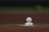A ball and rosin bag are on the pitcher's mound before a baseball game on Aug. 24, 2024, in Kansas City, Mo. The Brantford Red Sox of the Intercounty Baseball League are making all 21 of their home games free to 