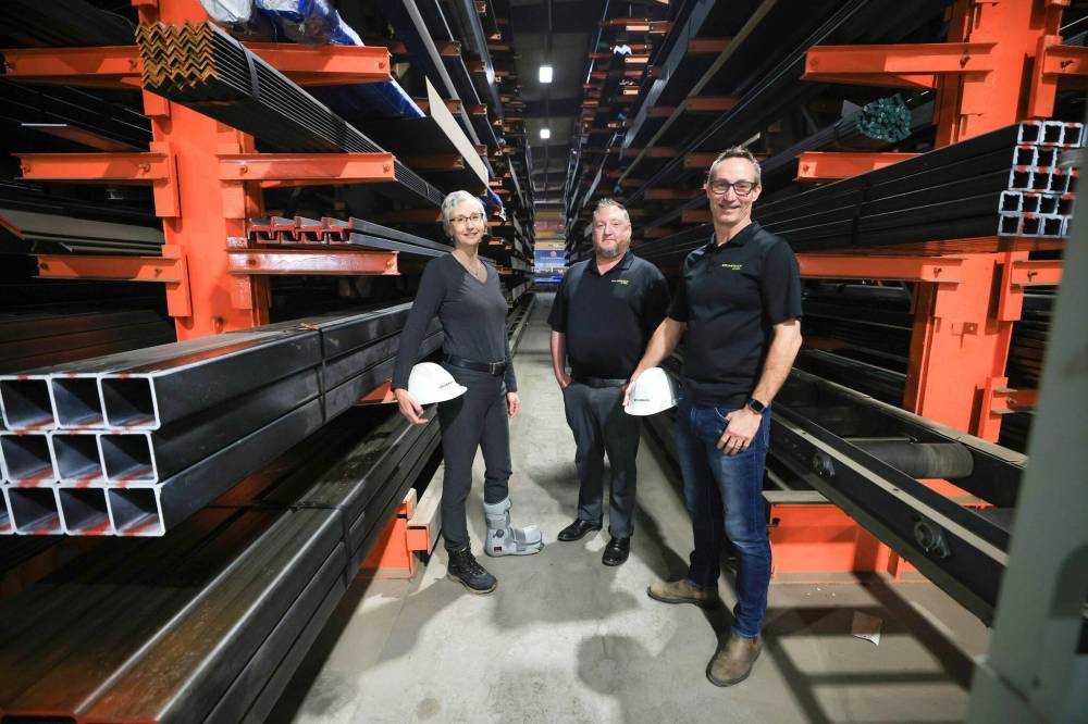 RUTH BONNEVILLE / FREE PRESS
From left, co-owner and vice-president Christine Dockter, general manager Adam Plouffe, and co-owner and president Justin Copp inside the Brunswick Steel warehouse.