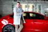 RUTH BONNEVILLE / FREE PRESS FILES
                                Trevor Nott, owner of Nott Autocorp, next to a Tesla in his showroom in 2022. Nott Autocorp released a statement on social media clarifying that — while it sells many of the electric car maker’s vehicles — it is not a franchisee and has no formal relationship with the company.