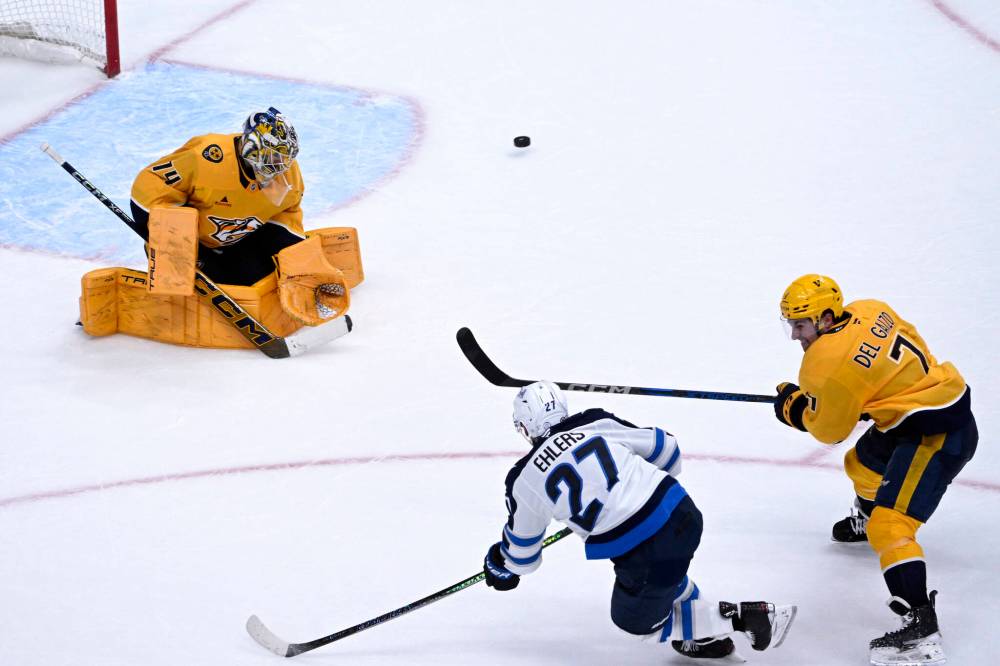 John Amis / The Associated Press
Predators goalie Juuse Saros stymied Nikolaj Ehlers late in the third period Thursday night in Nashville.