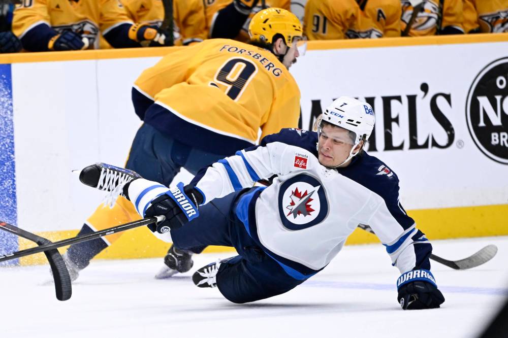 John Amis / The Associated Press
Jets centre Vladislav Namestnikov takes a tumble Thursday during second-period action.