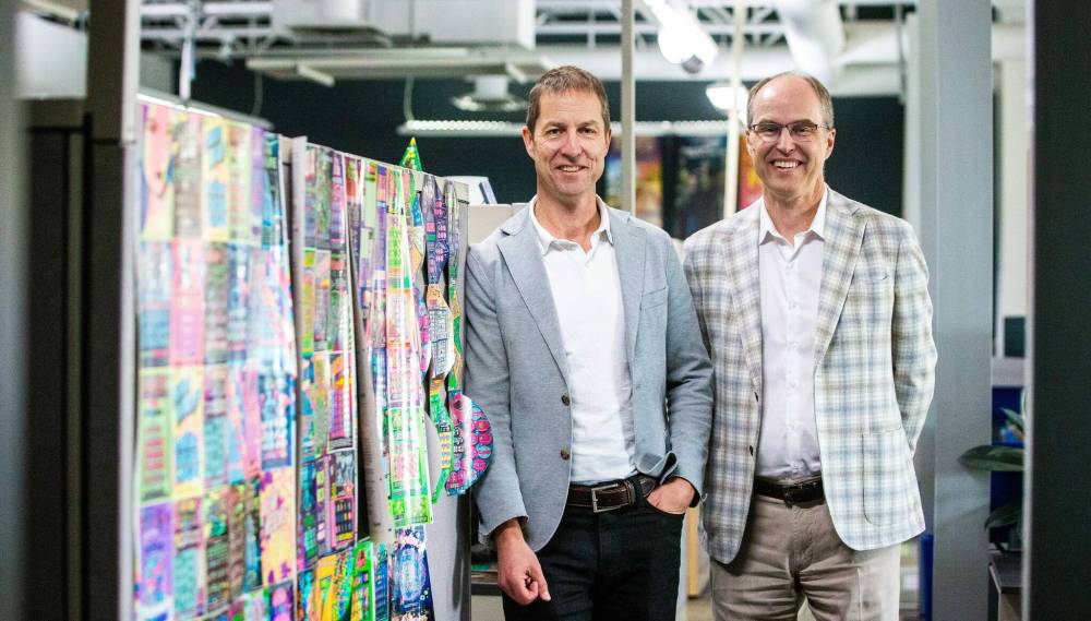 MIKAELA MACKENZIE / FREE PRESS
Doug (left) and John Pollard, brothers and the co-CEOs of Pollard Banknote, at their office in Winnipeg. Kansas Lottery launched the iLottery program earlier this month.