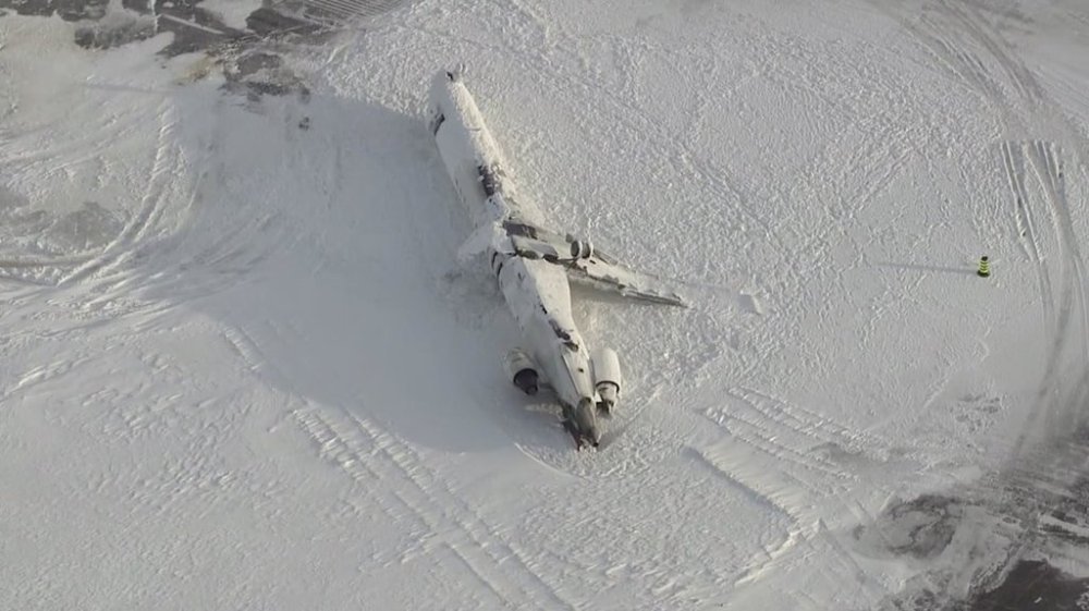The wreckage of a Delta Air Lines flight 4819 is seen on the tarmac of Pearson International Airport, in Toronto, in a Tuesday, Feb. 18, 2025, still image made from handout video footage. THE CANADIAN PRESS/HO-CTV, *MANDATORY CREDIT*