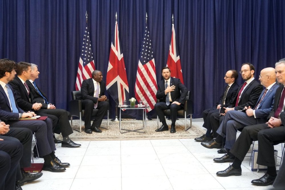 United States Vice-President JD Vance, right, and Britain's Foreign Secretary David Lammy during a bilateral meeting on the sidelines of the Munich Security Conference in Munich, Germany, Friday, Feb. 14, 2025. (AP Photo/Matthias Schrader)