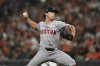 FILE - Boston Red Sox pitcher Lucas Sims throws during the seventh inning of a baseball game against the Baltimore Orioles, Aug. 17, 2024, in Baltimore. (AP Photo/Terrance Williams, file)