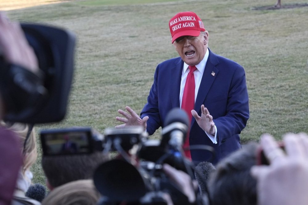 President Donald Trump speaks to reporters before departing on the South Lawn of the White House on Friday, Feb. 28, 2025 in Washington. THE CANADIAN PRESS/AP-Jacquelyn Martin