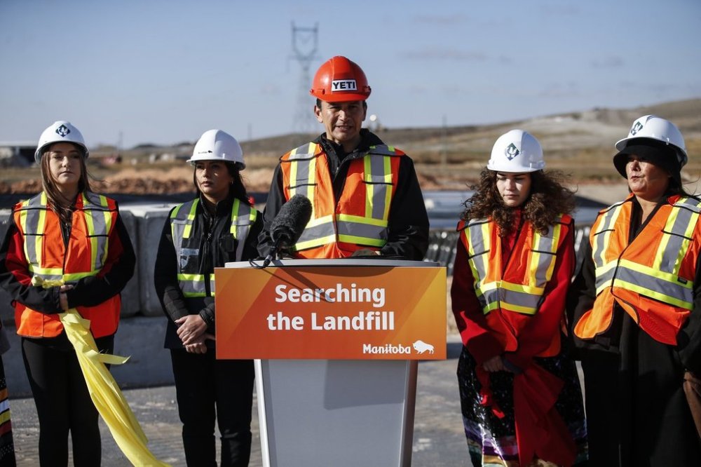 Manitoba Premier Wab Kinew speaks to media at a search facility site with families of Morgan Harris and Marcedes Myran, whose remains police believe were sent to the landfill just north of Winnipeg, Wednesday, Oct. 23, 2024. THE CANADIAN PRESS/John Woods