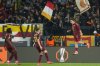 Roma's Paulo Dybala, right, celebrates with teammates after scoring his side's opening goal during the Europa League playoff second leg soccer match between Roma and Porto at the Stadio Olimpico in Rome, Italy, Thursday, Feb. 20, 2025. (AP Photo/Gregorio Borgia)