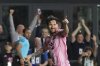 Inter Miami forward Lionel Messi (10) celebrates scoring his side's first goal against Sporting Kansas City during the first half of a CONCACAF Champions Cup soccer match, Tuesday, Feb. 25, 2025, in Fort Lauderdale, Fla. (AP Photo/Rebecca Blackwell)