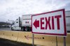 A truck waits to cross at the United States and Canada border in Surrey B.C., on Tuesday, March 4, 2025. THE CANADIAN PRESS/Ethan Cairns