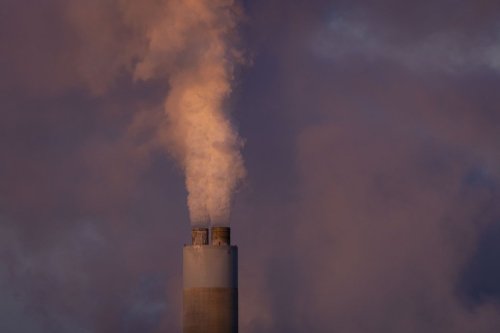 FILE - Carbon dioxide and other pollutant billows from a stack at PacifiCorp’s coal-fired Naughton Power Plant, near where Bill Gates company, TerraPower plans to build an advanced, nontraditional nuclear reactor, Jan. 13, 2022, in Kemmerer, Wyo. (AP Photo/Natalie Behring, File)