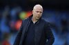 Liverpool's manager Arne Slot stands on the pitch prior to the English Premier League soccer match between Manchester City and Liverpool at Etihad stadium in Manchester, England, Sunday, Feb. 23, 2025. (AP Photo/Dave Thompson)