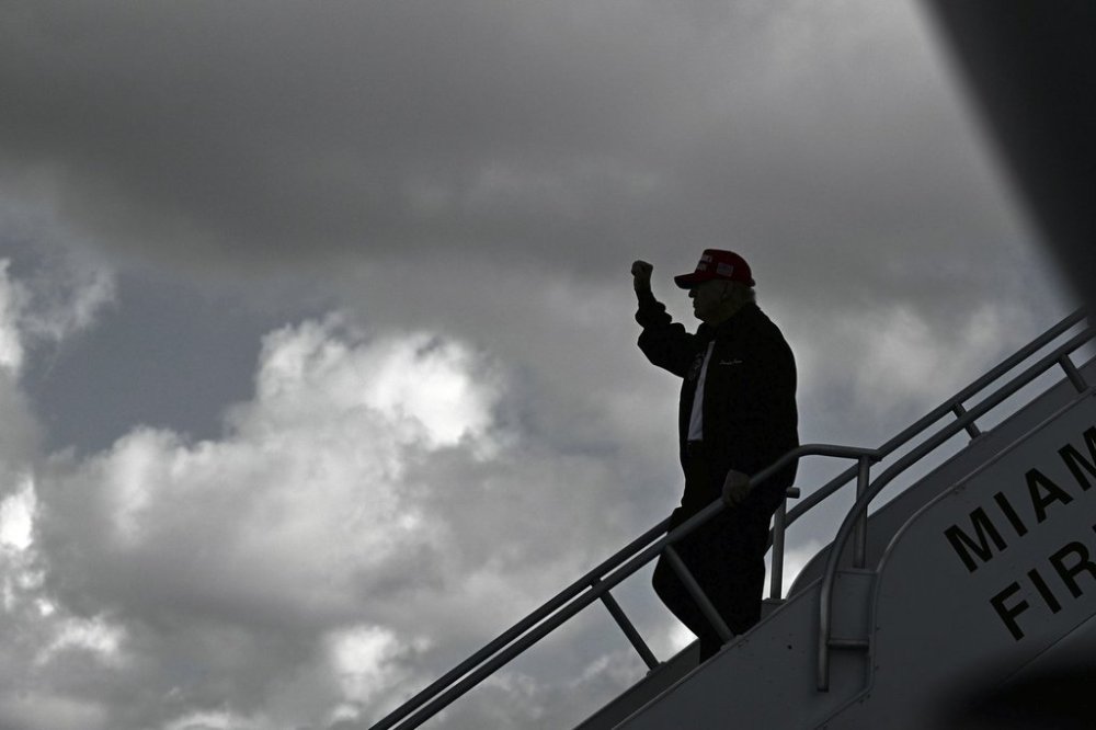 President Donald Trump steps off Air Force One upon arrival at Miami International Airport, Wednesday, Feb. 19, 2025, in Miami. (Photo image via AP)