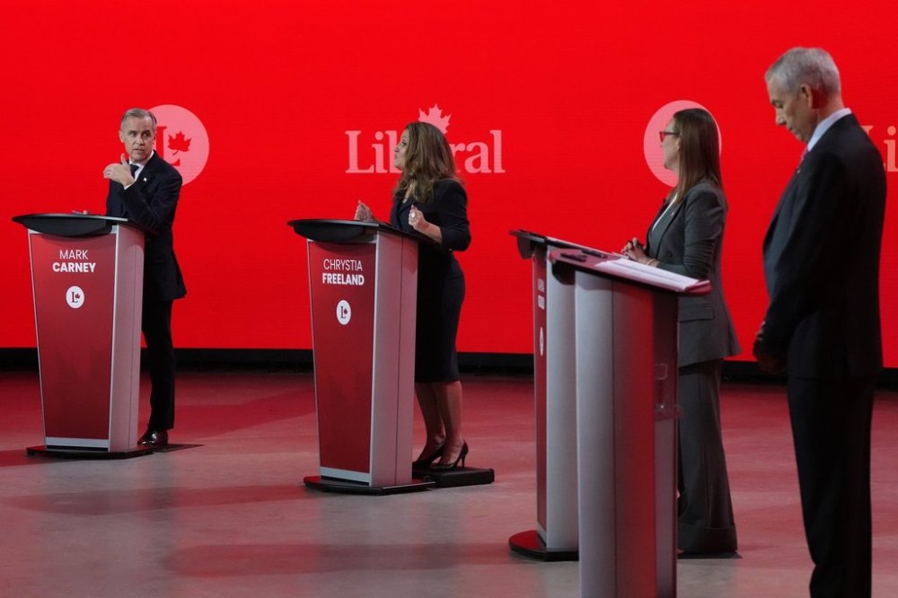 Liberal Party of Canada leadership candidates (left to right) Mark Carney, Chrystia Freeland, Karina Gould and Frank Baylis take part in the French-language Liberal leadership debate in Montreal on Monday, Feb. 24, 2025. The federal Liberals will pick a new leader on March 9. THE CANADIAN PRESS/Christinne Muschi