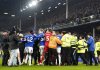 Liverpool and Everton players tussle following the final whistle in a Premier League soccer match at Goodison Park, Wednesday, Feb. 12, 2025, in Liverpool. (Nick Potts/PA via AP)