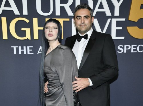 Lady Gaga, left, and fiancé Michael Polansky attend the 