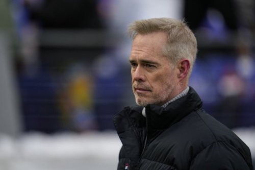 FILE - ESPN broadcaster Joe Buck walks the field before an NFL football AFC divisional playoff game between the Baltimore Ravens and the Houston Texans, Saturday, Jan. 20, 2024, in Baltimore. (AP Photo/Julio Cortez,File)