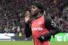 Leverkusen's Jeremie Frimpong celebrates after he scored his side's second goal during the German Bundesliga soccer match between Bayer Leverkusen and TSG Hoffenheim at the BayArena in Leverkusen, Germany, Sunday, Feb. 2, 2025. (AP Photo/Martin Meissner)