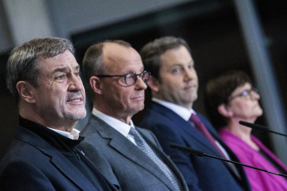 From left, Markus Söder, Chairman of the CSU and Minister President of Bavaria, Friedrich Merz, candidate for Chancellor of the CDU/CSU, Chairman of the CDU/CSU parliamentary group and Federal Chairman of the CDU, Lars Klingbeil, Chairman of the SPD parliamentary group and Federal Chairman of the SPD, and Saskia Esken, Party Chairwoman of the SPD, hold a press conference in Berlin, Tuesday, March 4, 2025. (Carsten Koall/dpa via AP)