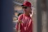 Cincinnati Reds manager Terry Francona gestures as he speaks during spring training baseball practice at the team's training facility in Goodyear, Ariz., Saturday, Feb. 15, 2025. (AP Photo/Carolyn Kaster)