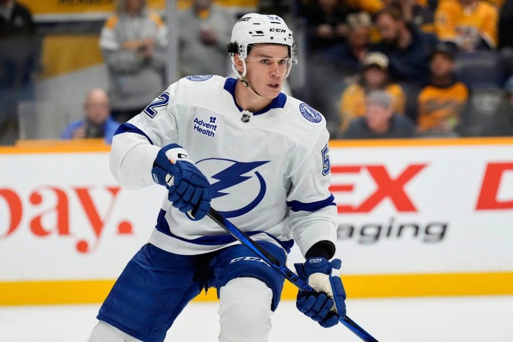 FILE- Tampa Bay Lightning's Maxim Groshev (52) plays against the Nashville Predators during the second period of a preseason NHL hockey game Saturday, Sept. 28, 2024, in Nashville, Tenn. (AP Photo/Mark Humphrey, File)