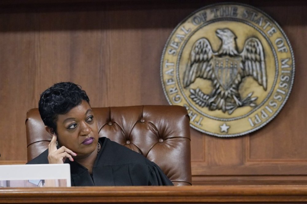 FILE - Hinds County Chancery Judge Crystal Wise Martin listens to lawyer Rob McDuff, an attorney for Parents For Public Schools, during a hearing in Jackson, Miss., Aug. 23, 2022. (AP Photo/Rogelio V. Solis, File)
