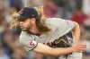 FILE - Cleveland Guardians pitcher Scott Barlow works against the Toronto Blue Jays during the seventh inning of a baseball game in Toronto, Friday, June 14, 2024. (Chris Young/The Canadian Press via AP, File)