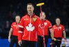 Team Canada skip Brad Gushue raises his broom to the crowd after defeating Team Alberta-Bottcher 7-3 during the playoffs at the Brier, in Regina, on Saturday, March 9, 2024. THE CANADIAN PRESS/Darryl Dyck