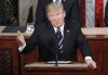 FILE - President Donald Trump gestures towards Democrats while addressing a joint session of Congress at the U.S. Capitol in Washington, Feb. 28, 2017. (AP Photo/Pablo Martinez Monsivais, File)