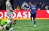 Vancouver Whitecaps' Ali Ahmed (22) celebrates his goal against CF Montreal goalkeeper Jonathan Sirois during the second half of an MLS soccer game in Vancouver, on Saturday, April 1, 2023. THE CANADIAN PRESS/Darryl Dyck