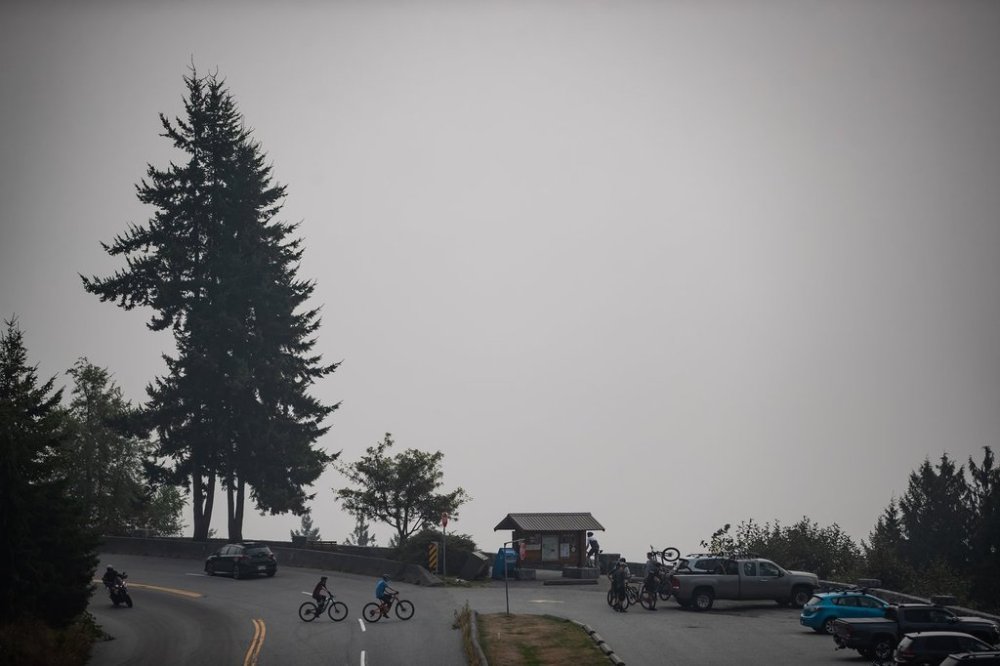 Smoke from wildfires burning in the U.S. obscures the view of downtown Vancouver, at a lookout at Cypress Provincial Park, in West Vancouver, B.C., on Saturday, Sept. 12, 2020. THE CANADIAN PRESS/Darryl Dyck