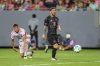 Lionel Messi of Inter Miami FC makes a pass during the second half of a preseason MLS soccer match against Orlando City on Friday, Feb. 14, 2025, in Tampa, Fla. (AP Photo/Mike Carlson)