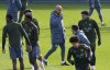 Manchester City manager Pep Guardiola, centre, attends a training session at the City Football Academy, Manchester, England, Tuesday, Feb. 18, 2025, ahead of the Champions League playoff second leg soccer match between Real Madrid and Manchester City. (Martin Rickett/PA via AP)