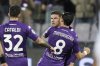 Fiorentina's Robin Gosens, center, celebrates scoring with teammates during the Italian Serie A soccer match between Fiorentina and Lecce, at the Artemio Franchi Stadium in Florence, Italy, Friday Feb. 28, 2025. (Massimo Paolone/LaPresse via AP)